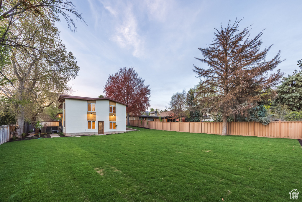 View of yard featuring a fenced backyard