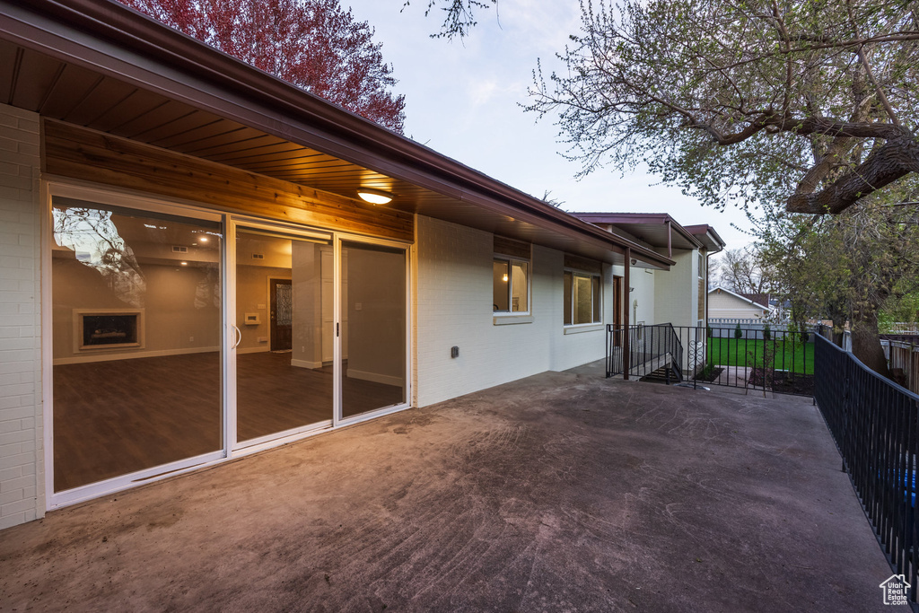 View of patio with fence