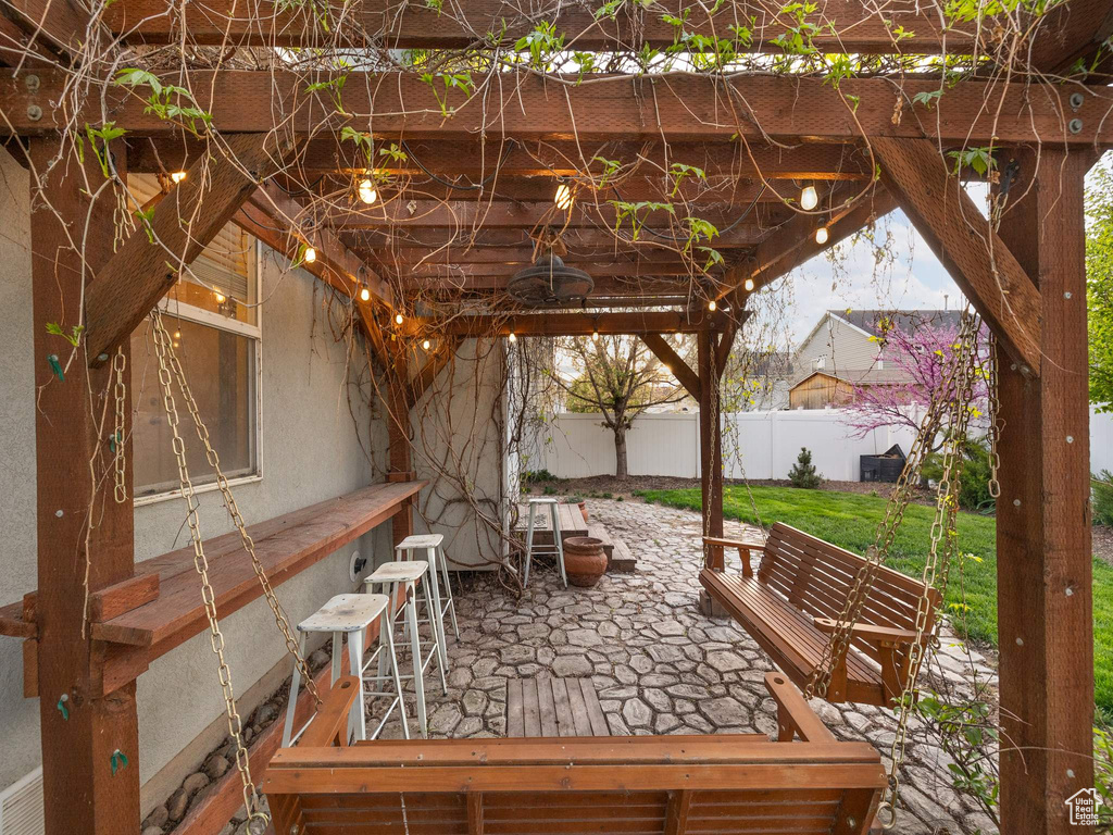 View of patio / terrace featuring fence and a wooden deck