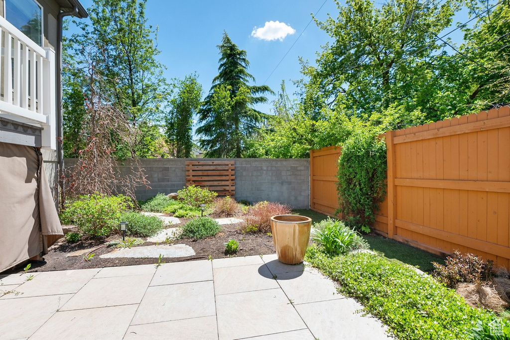 View of yard featuring a patio and a fenced backyard