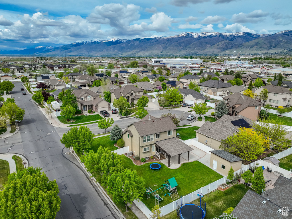 Drone / aerial view with a mountain view and a residential view