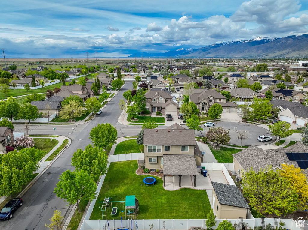 Drone / aerial view with a mountain view and a residential view