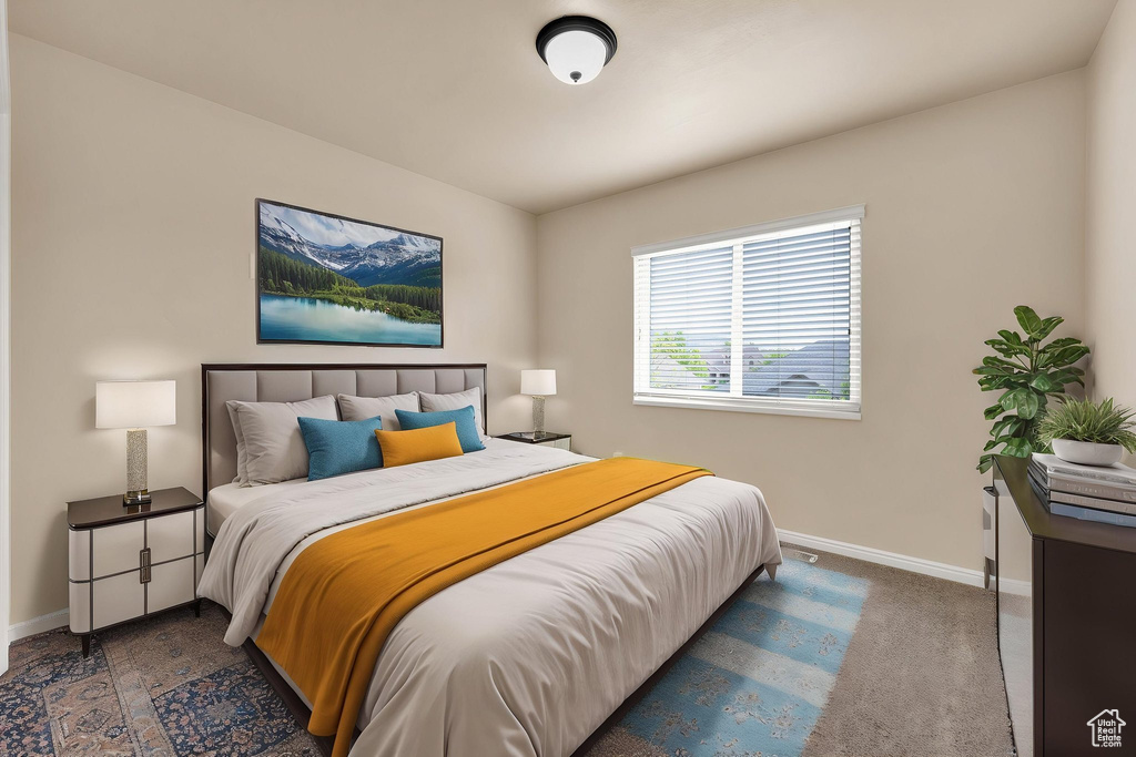 Bedroom with baseboards and carpet flooring