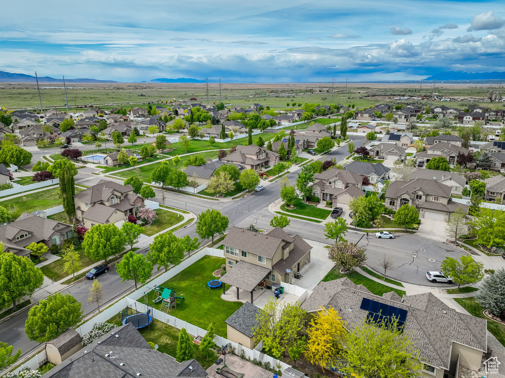 Drone / aerial view with a mountain view and a residential view