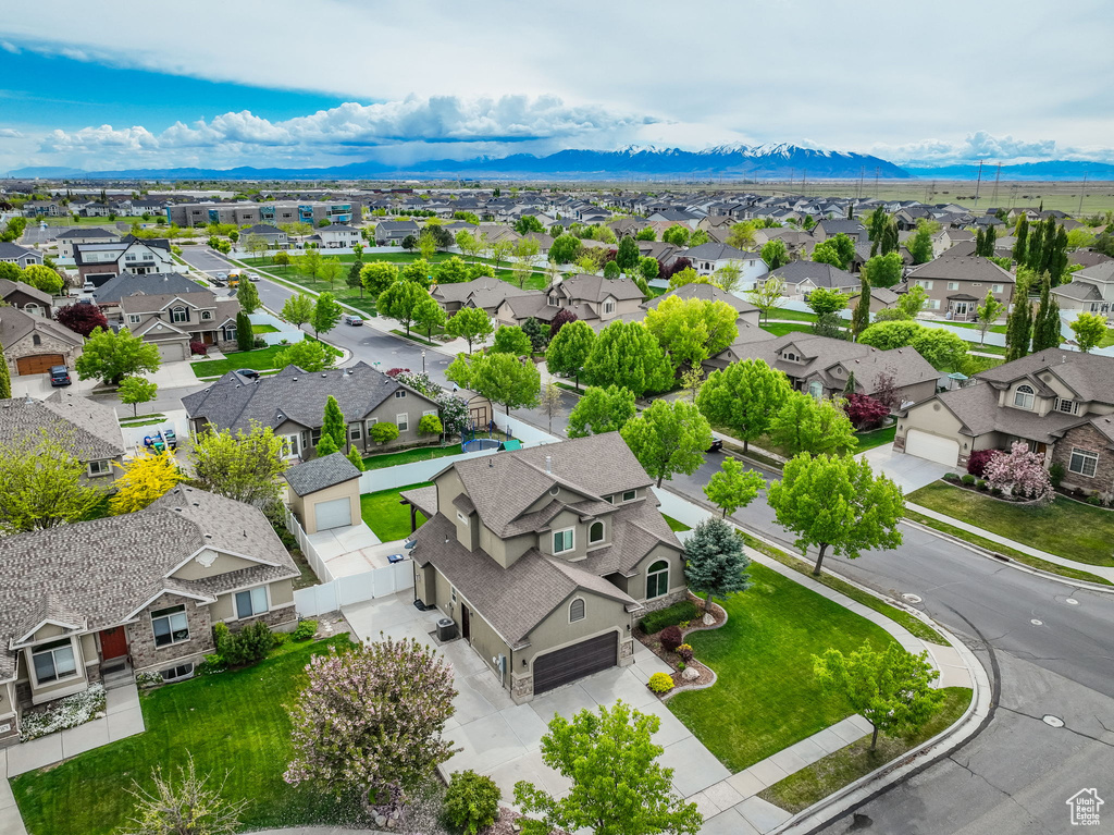 Drone / aerial view with a residential view and a mountain view