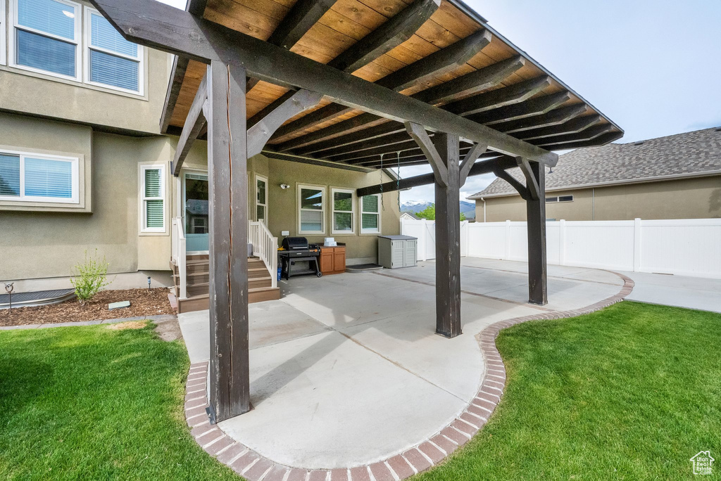 View of patio / terrace with fence and entry steps