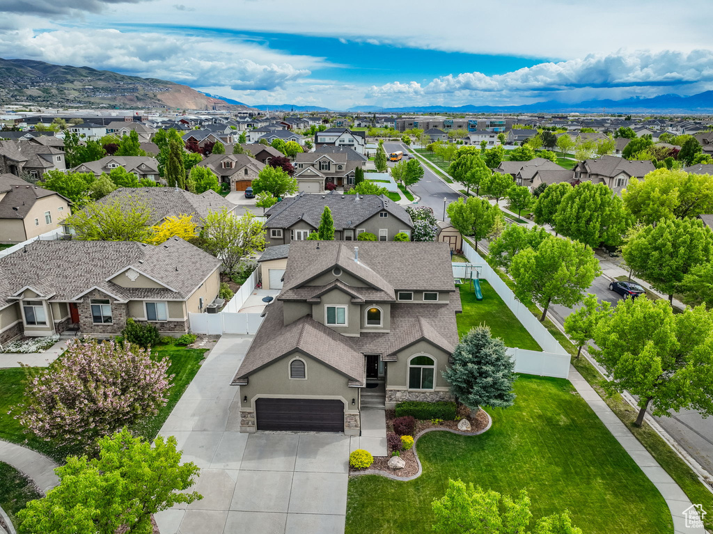 Aerial view featuring a mountain view and a residential view