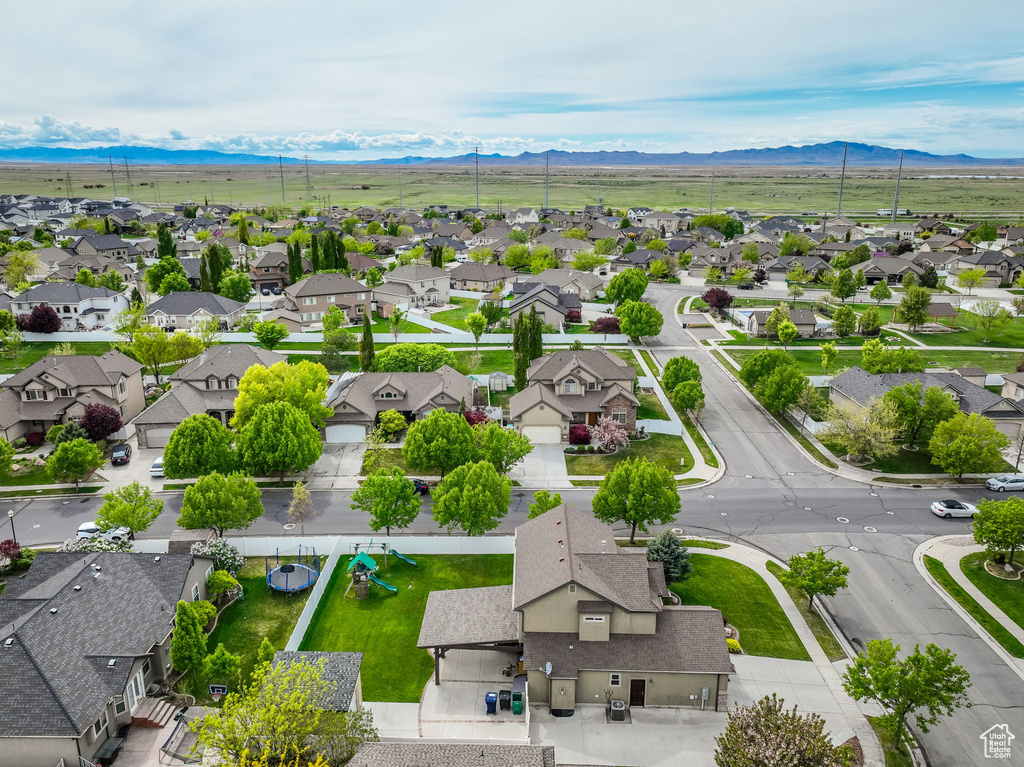 Birds eye view of property featuring a residential view and a mountain view