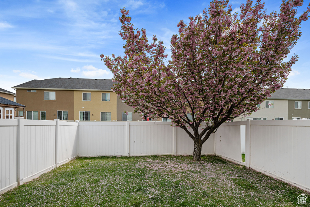 View of yard with a fenced backyard