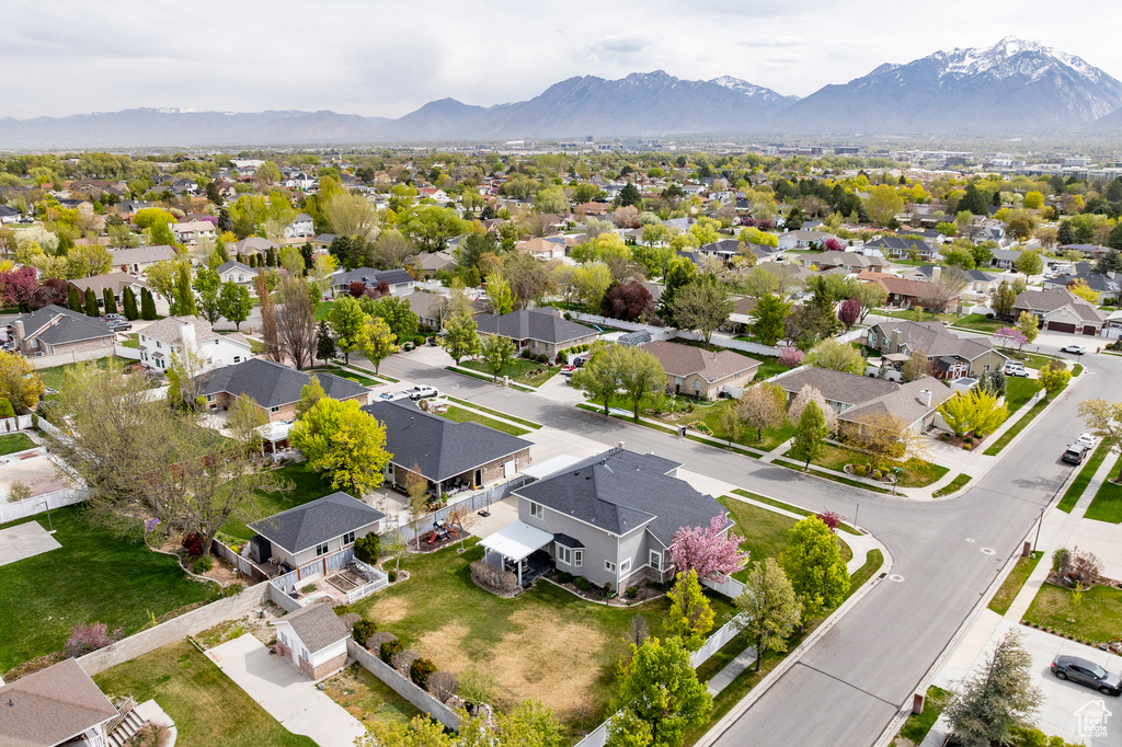 Drone / aerial view with a residential view and a mountain view