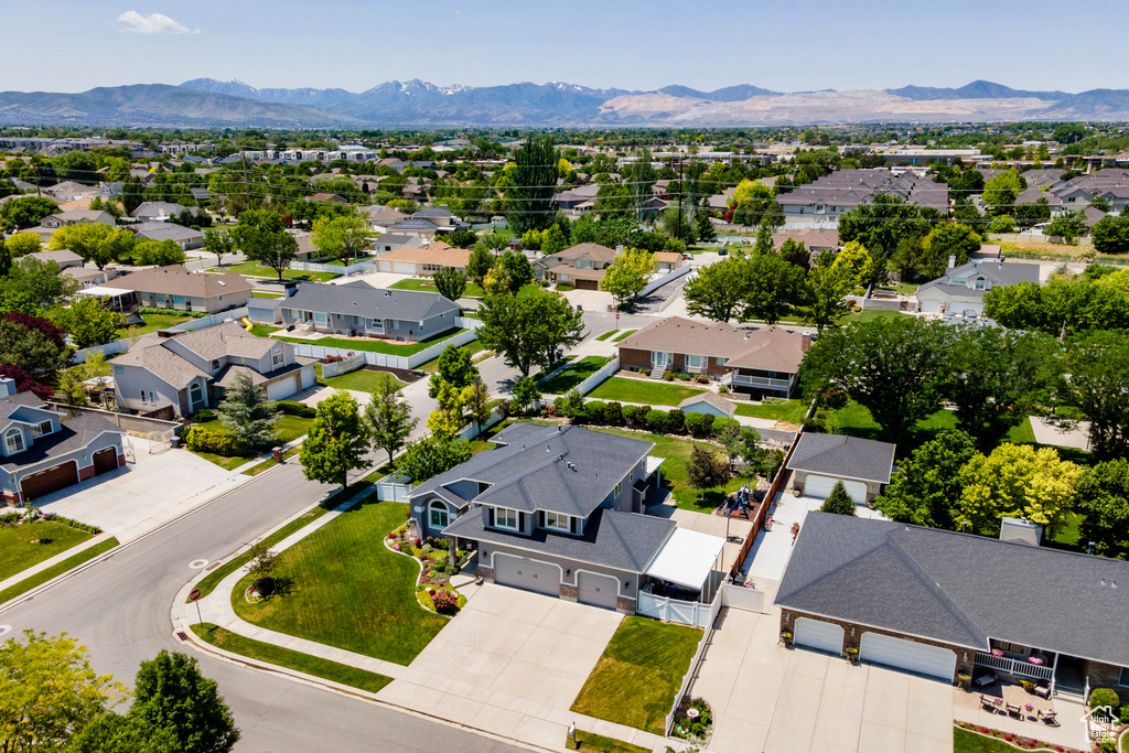 Aerial view of residential area with a mountainous background