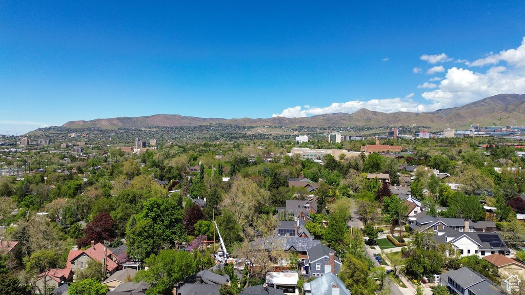 Birds eye view of property featuring a residential view and a mountain view