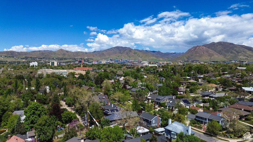 Drone / aerial view featuring a mountain view and a residential view