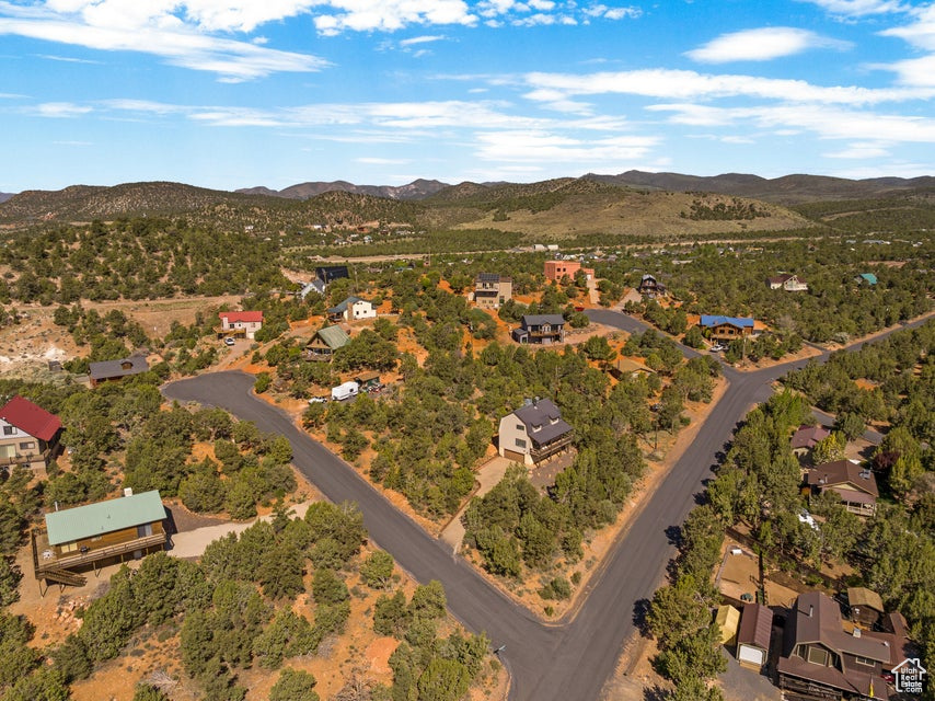 Birds eye view of property featuring a residential view and a mountain view