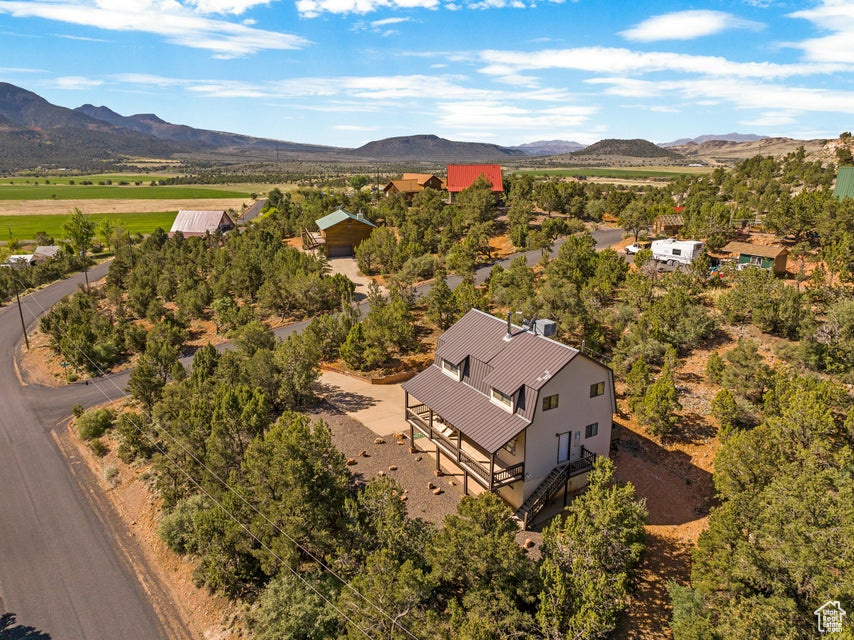 Birds eye view of property featuring a mountain view