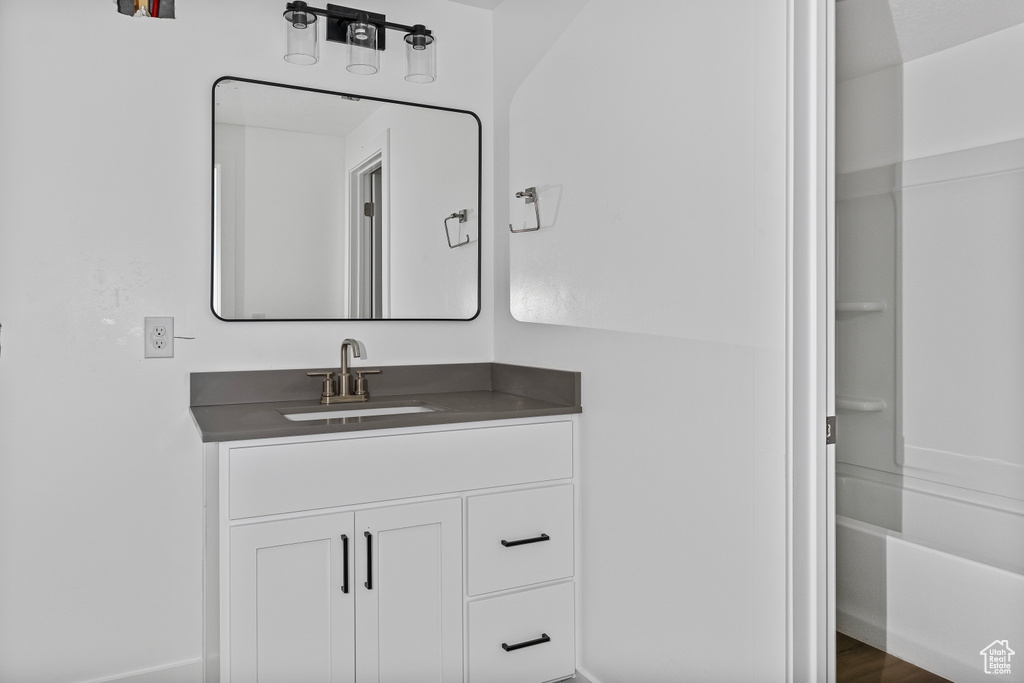 Full bathroom with vanity