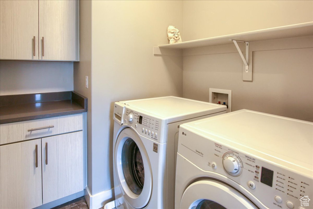 Laundry room with washer and dryer