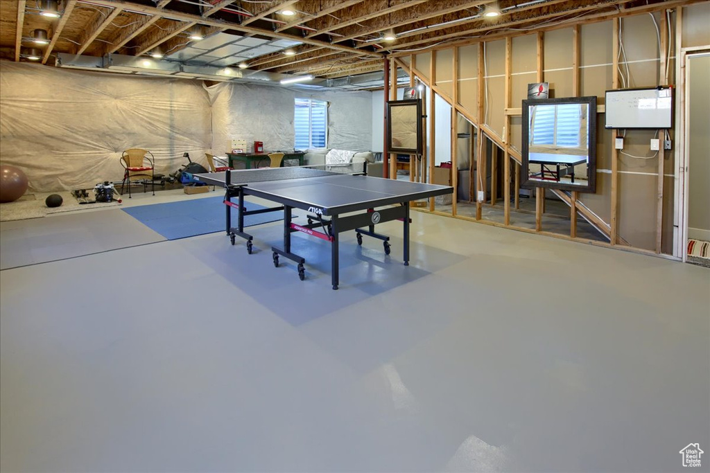 Rec room with finished concrete flooring