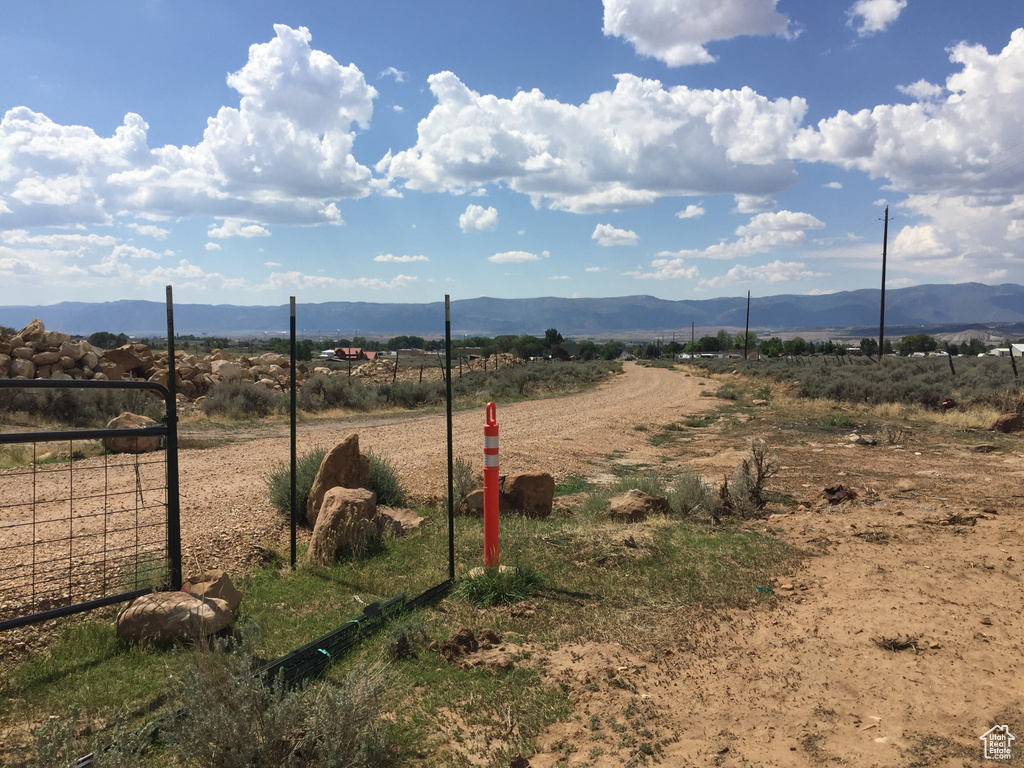 Property view of mountains featuring a rural view