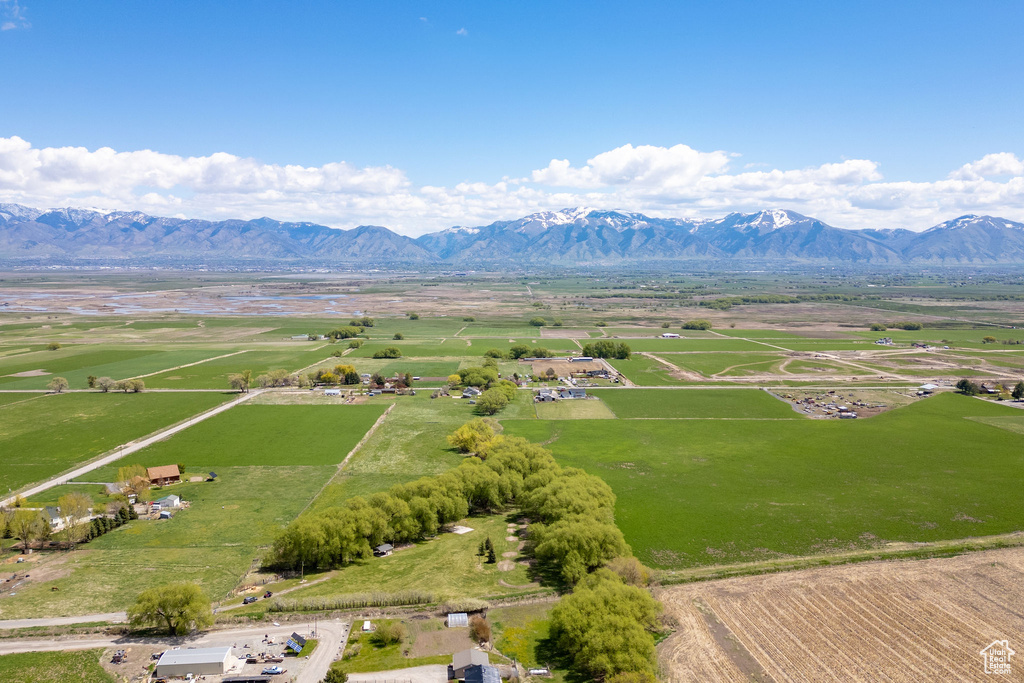 Birds eye view of property with a mountain view and a rural view