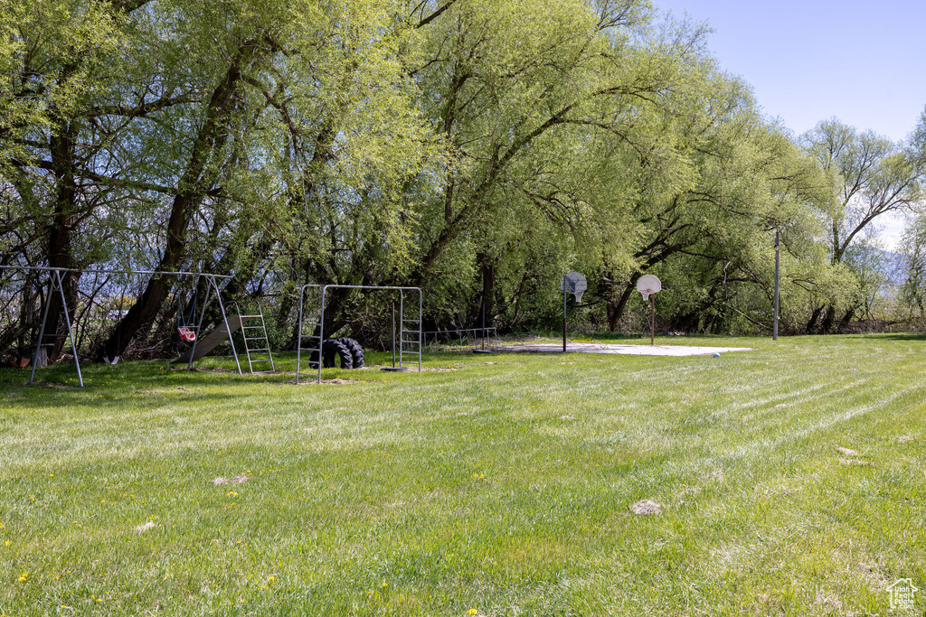 View of yard with a playground