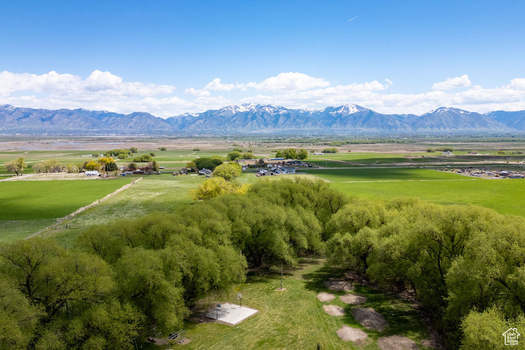 Birds eye view of property with a mountain view and a rural view