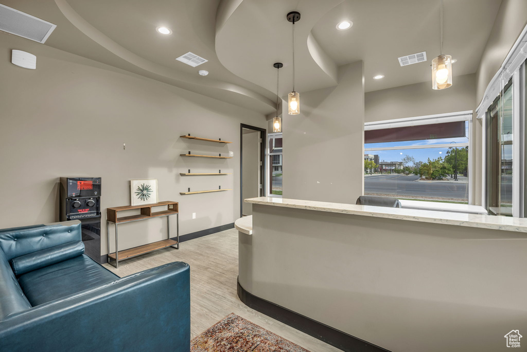 Interior space featuring visible vents, recessed lighting, and light wood-type flooring