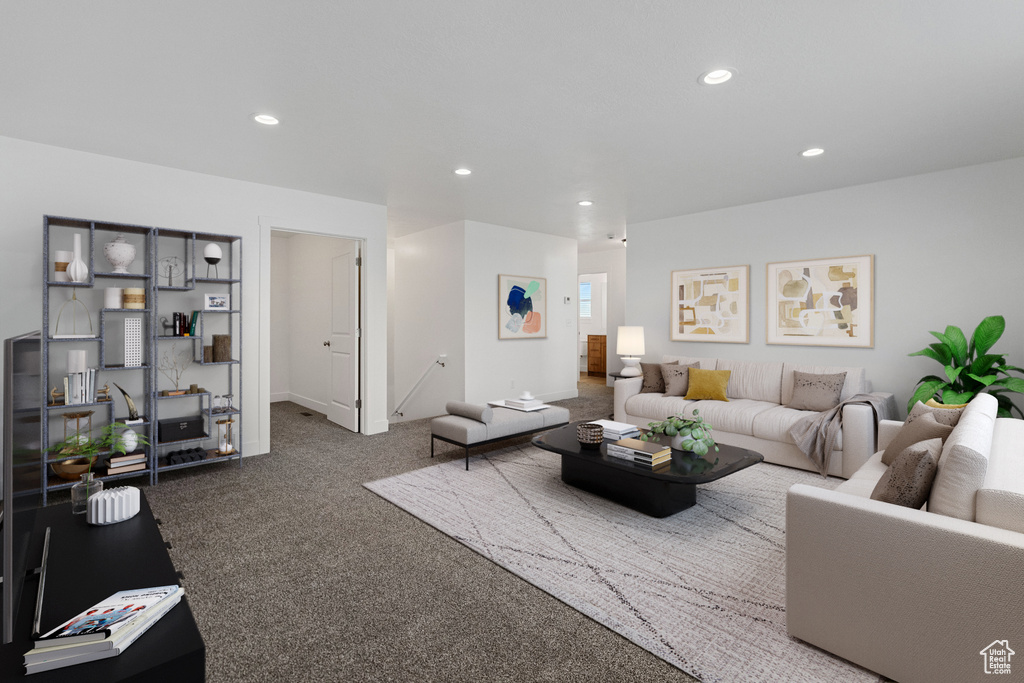 Living area featuring recessed lighting and carpet