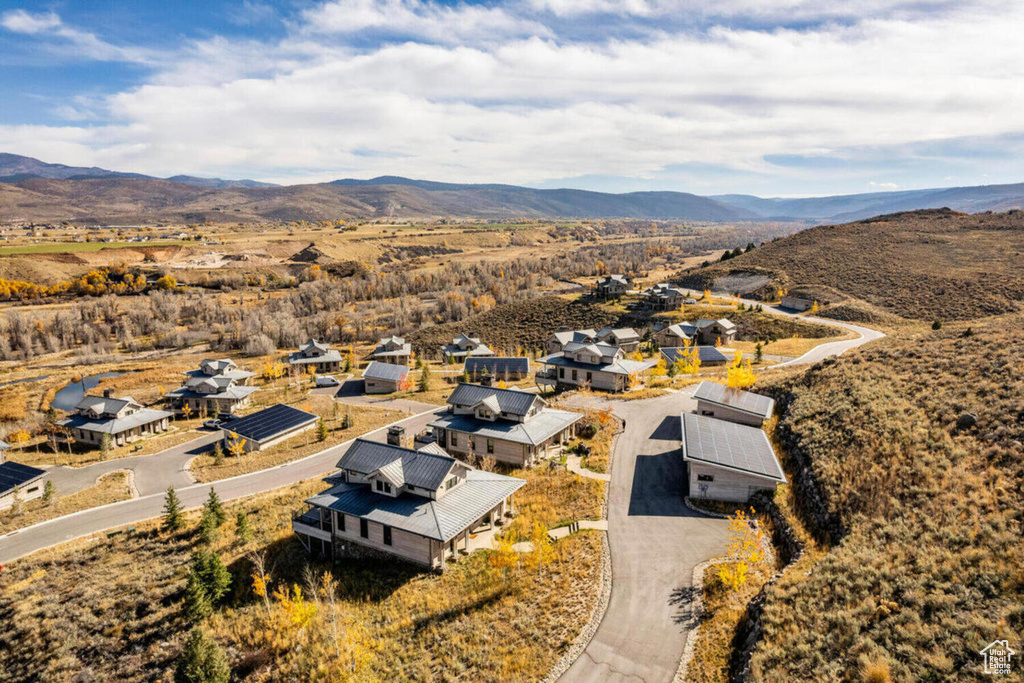 Aerial view featuring a mountain view and a residential view