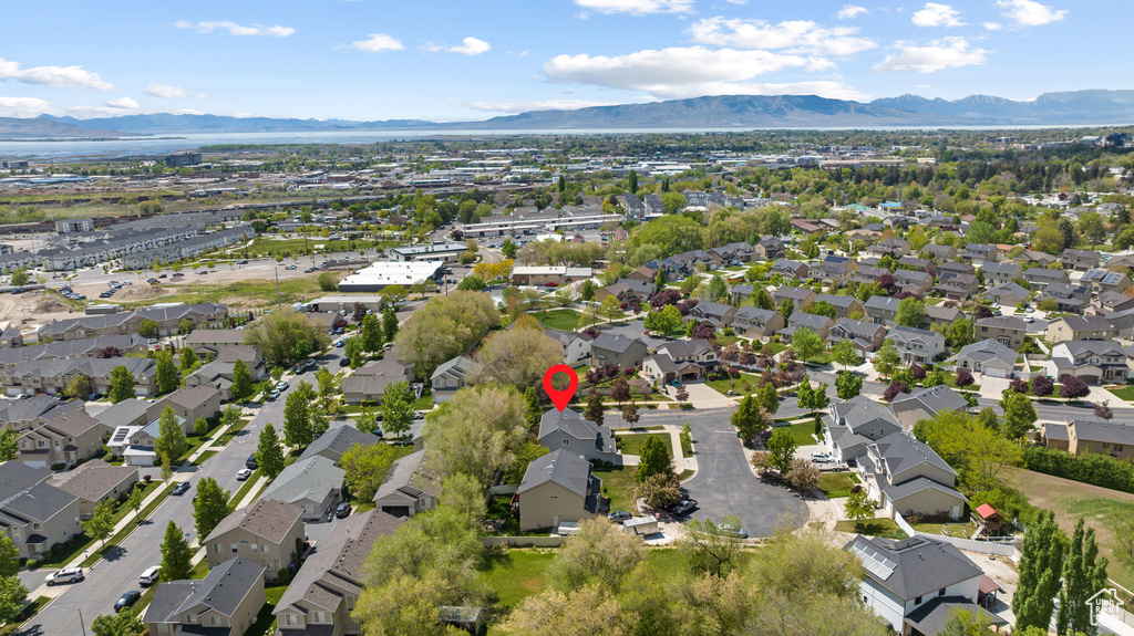Drone / aerial view with a residential view and a mountain view