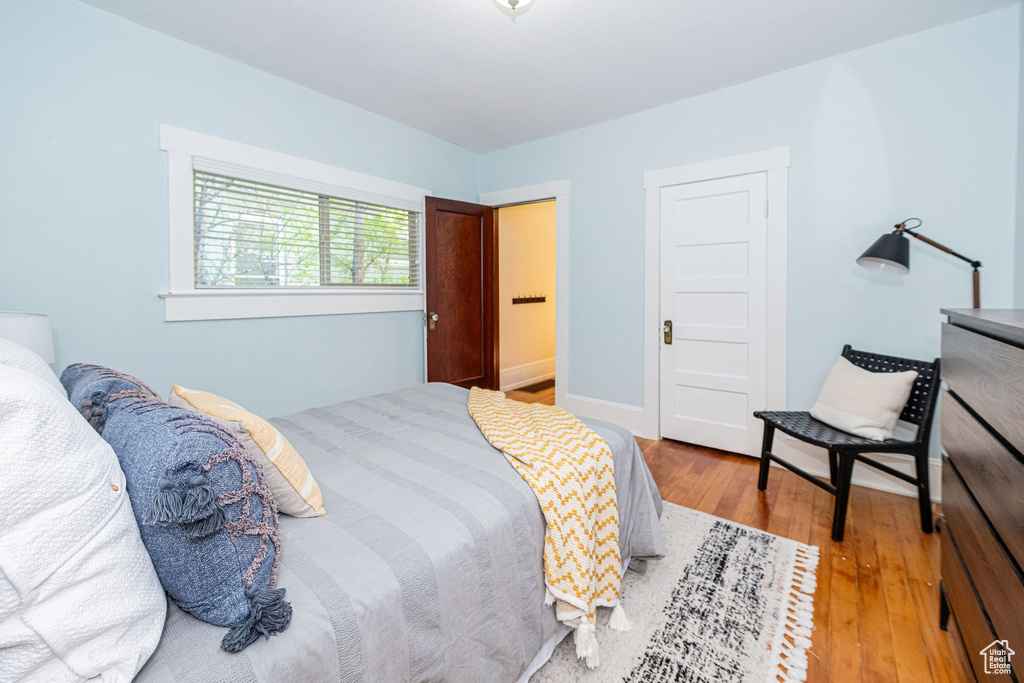 Bedroom with wood finished floors