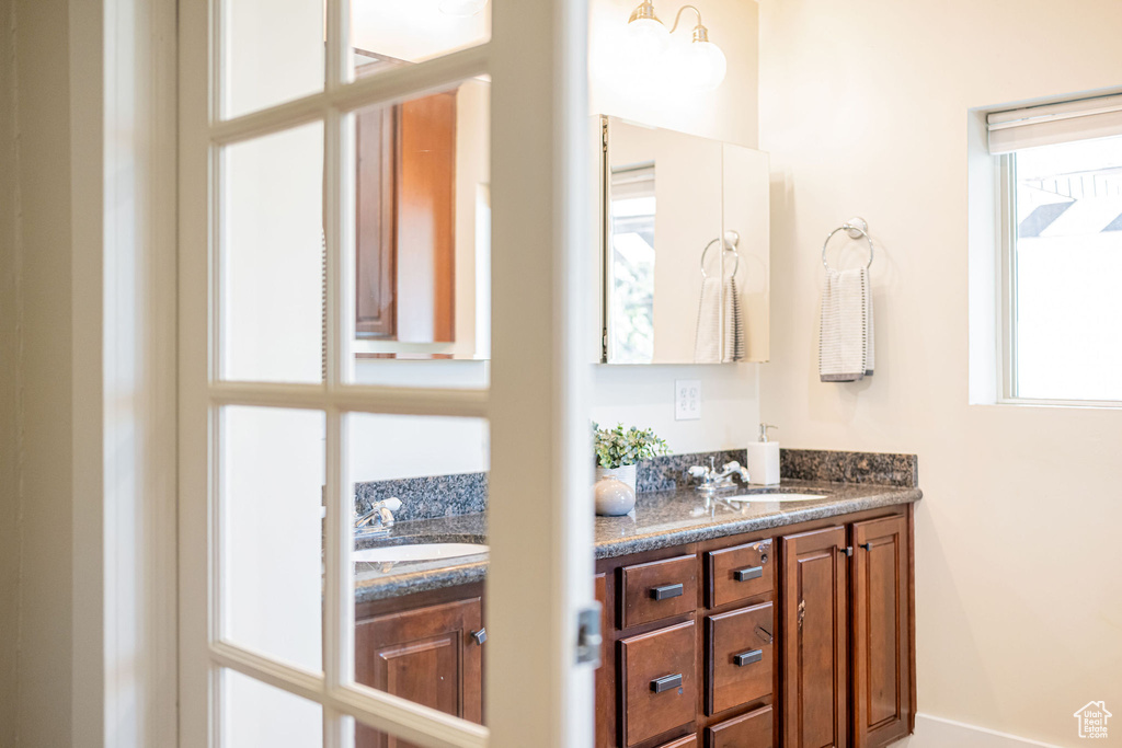 Bathroom with double vanity and a sink