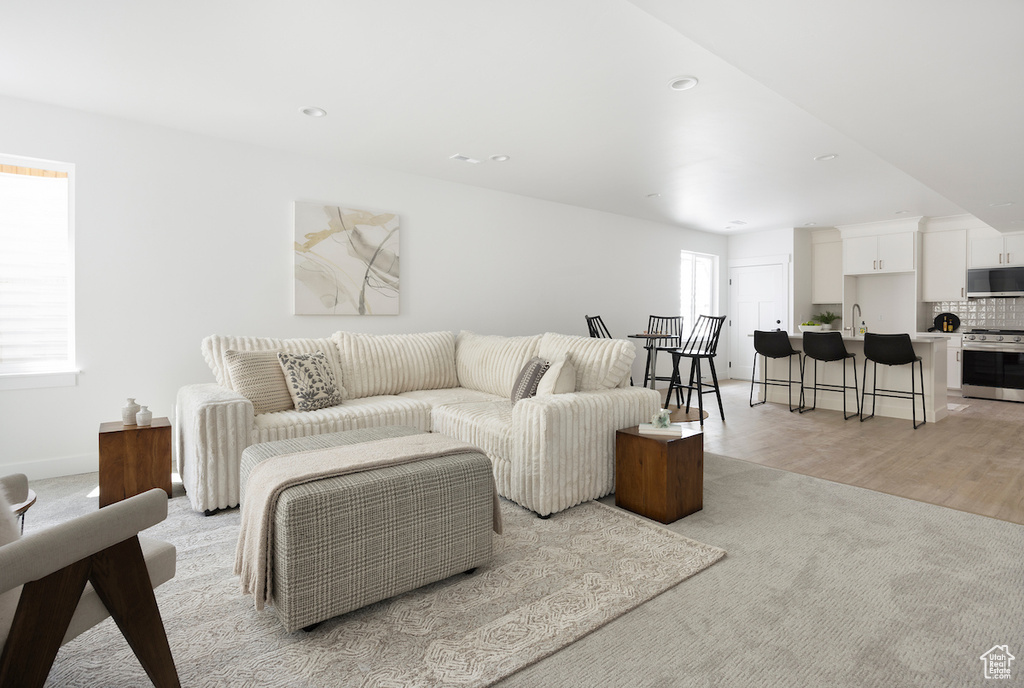 Living room with light carpet