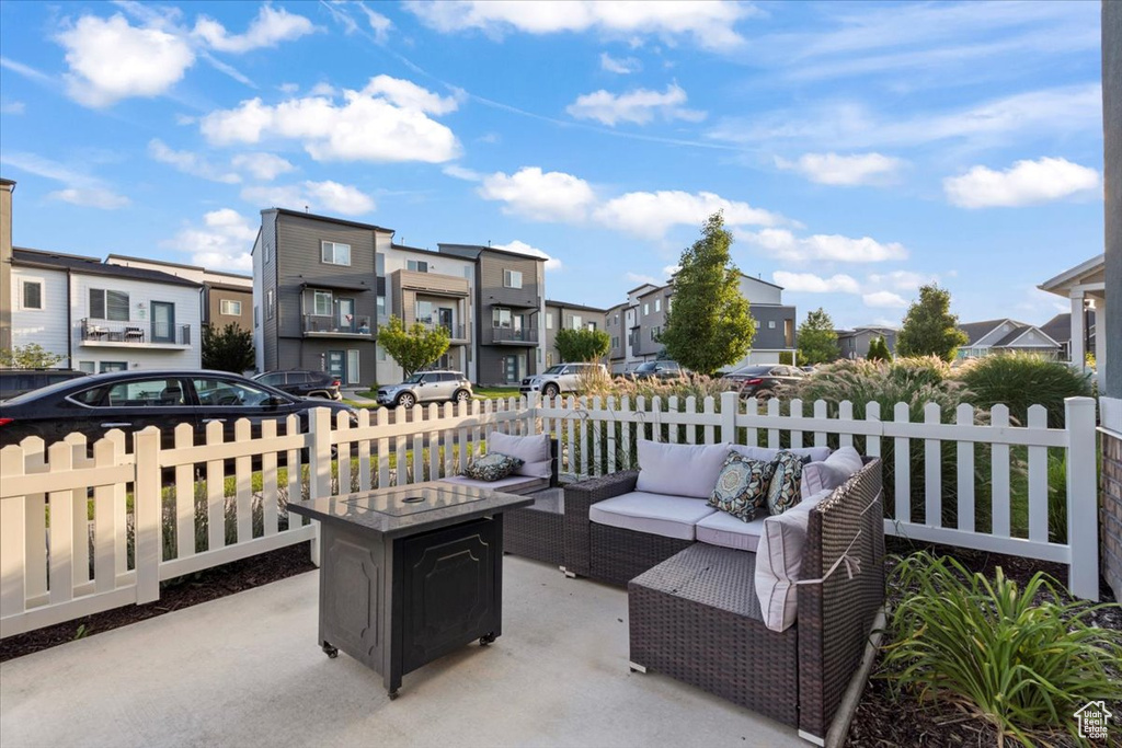 View of patio featuring a residential view and an outdoor hangout area