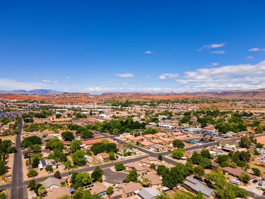 Drone / aerial view with a residential view and a mountain view