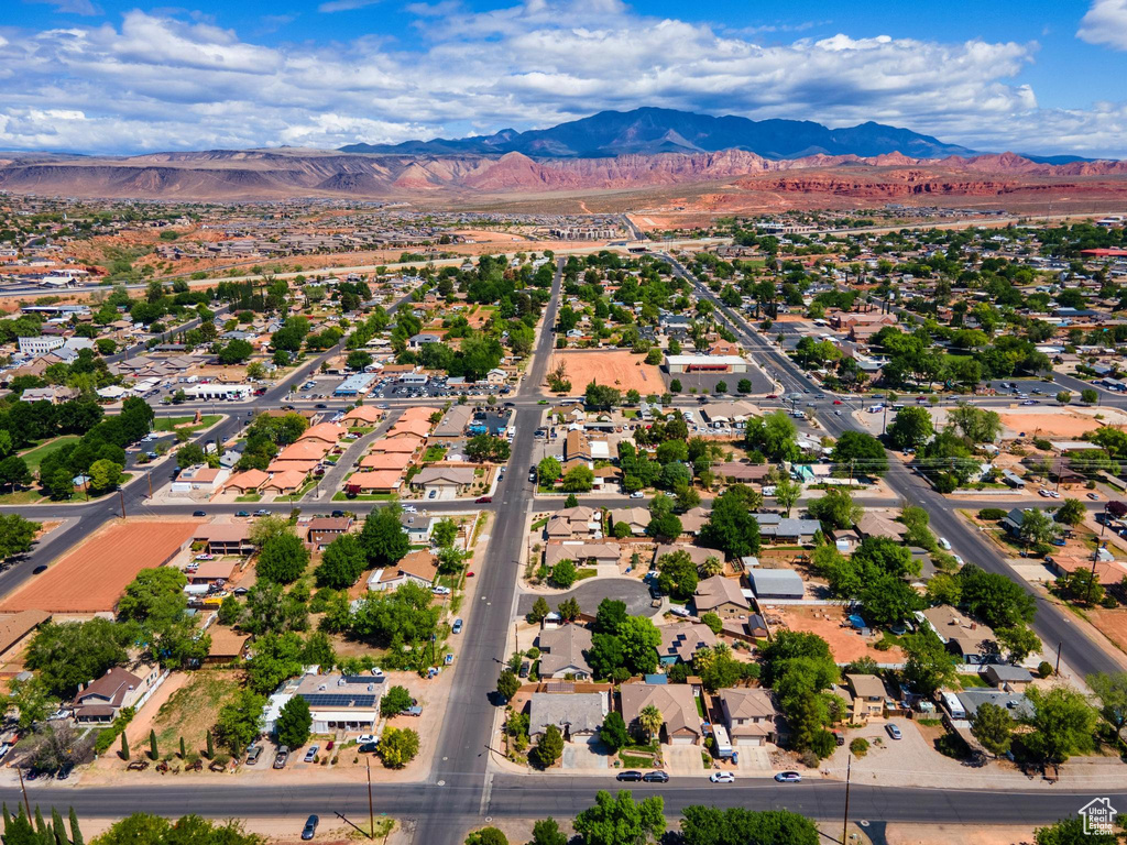 Birds eye view of property featuring a mountain view and a residential view