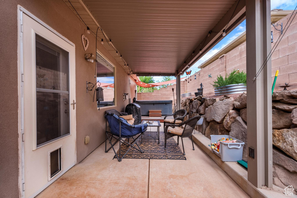 View of patio / terrace featuring fence