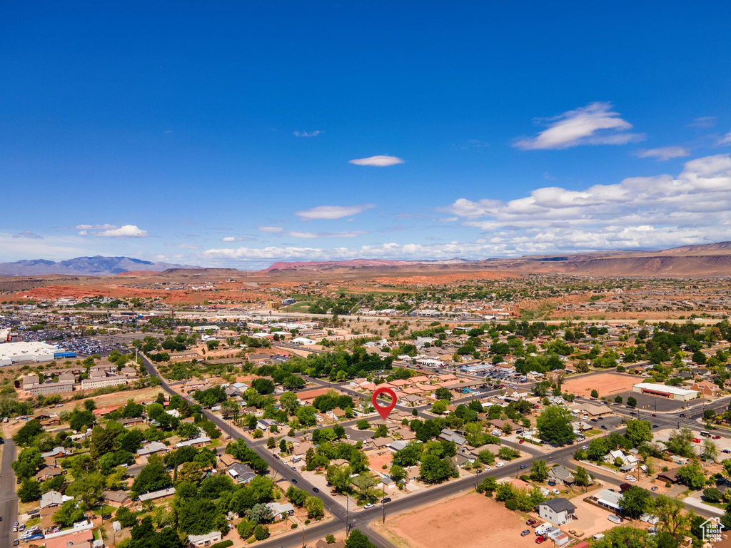 Birds eye view of property featuring a mountain view