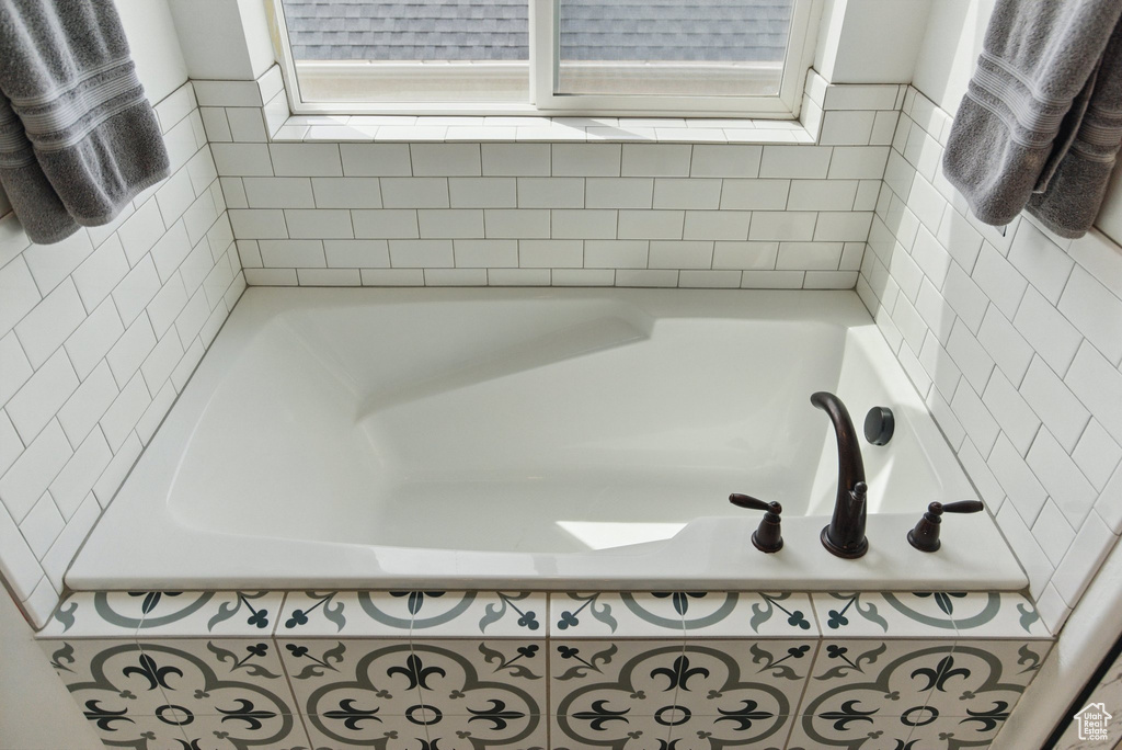 Full bath featuring a garden tub