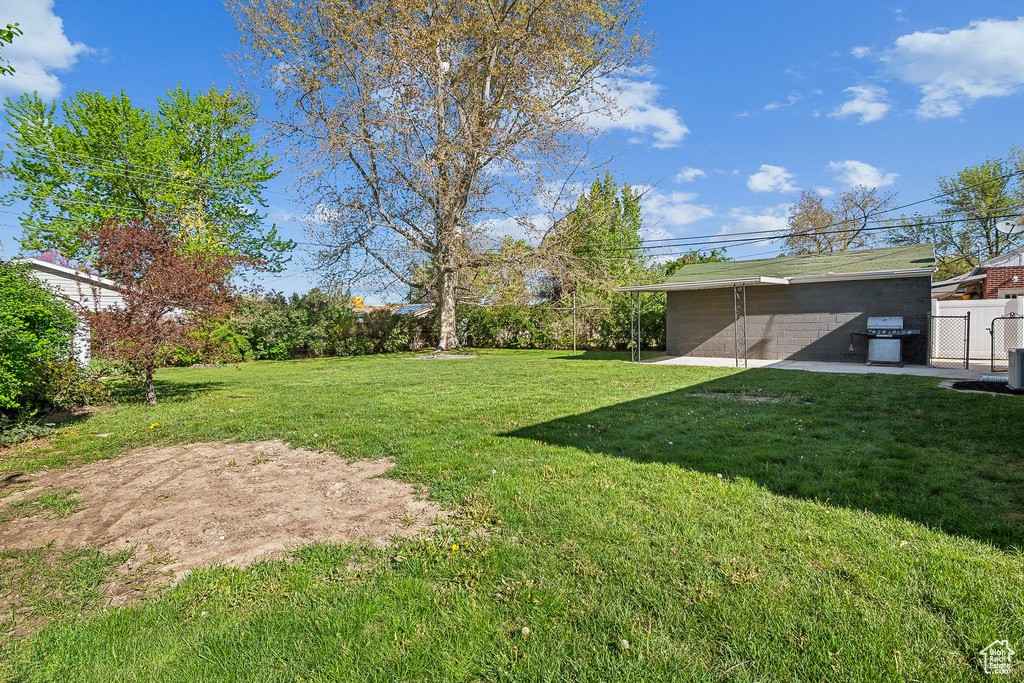View of yard with fence