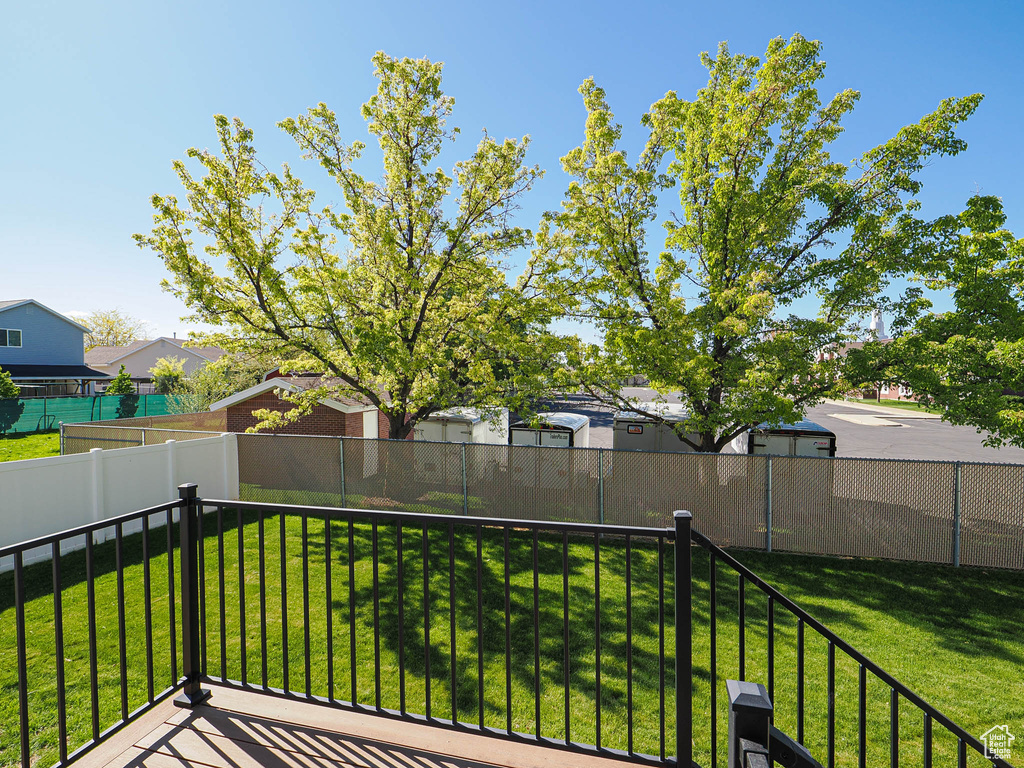 Exterior space with fence and a residential view