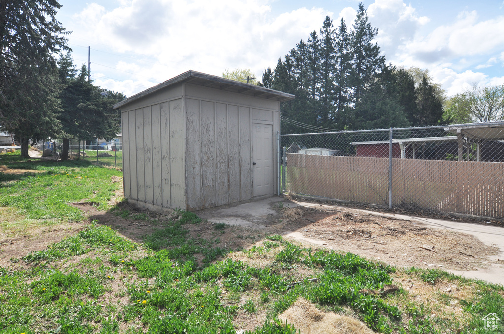 View of shed with fence