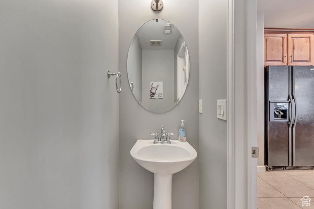 Bathroom featuring tile patterned floors