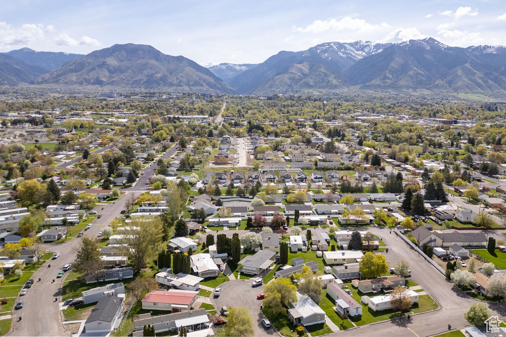 Birds eye view of property featuring a residential view and a mountain view