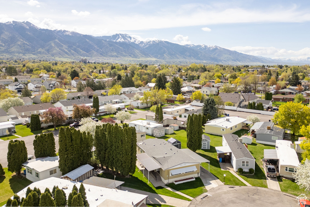 Birds eye view of property featuring a residential view and a mountain view