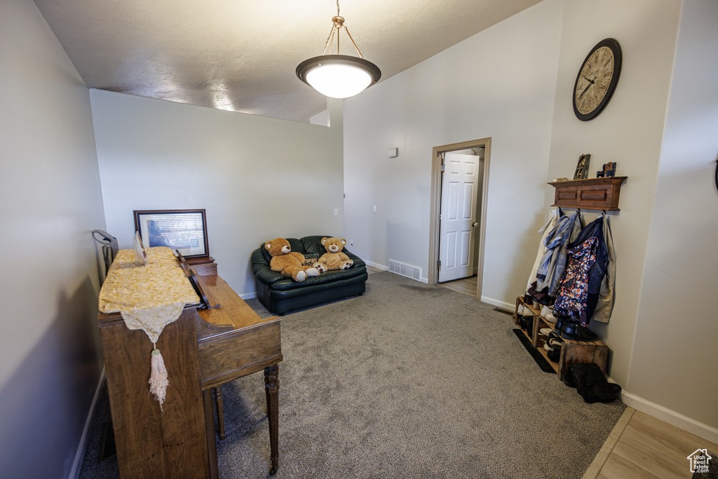 Sitting room featuring baseboards and visible vents