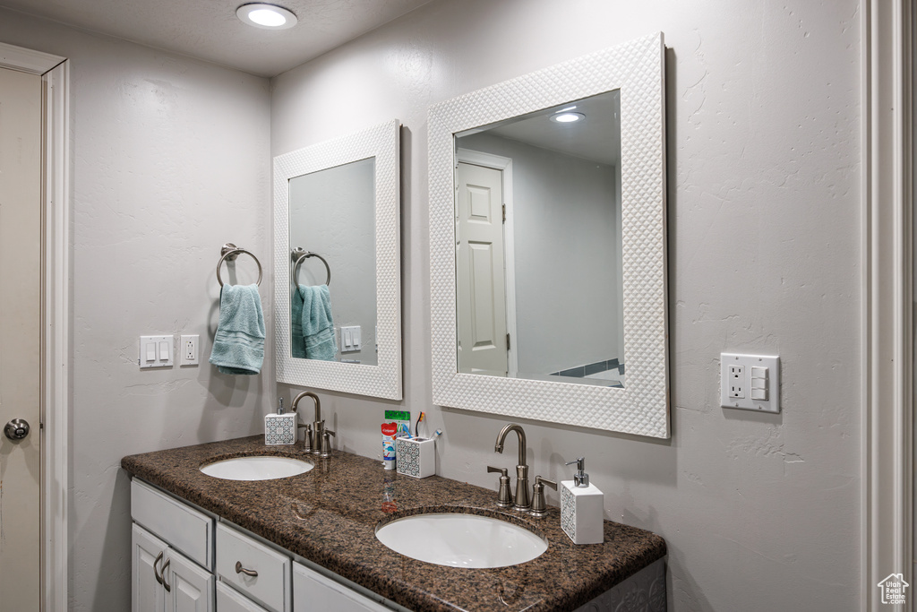 Bathroom with double vanity and a sink
