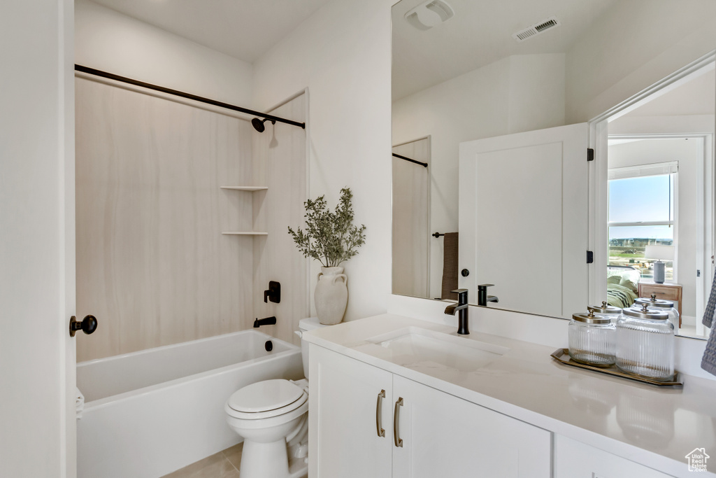 Full bathroom with visible vents, tile patterned flooring, vanity, toilet, and washtub / shower combination