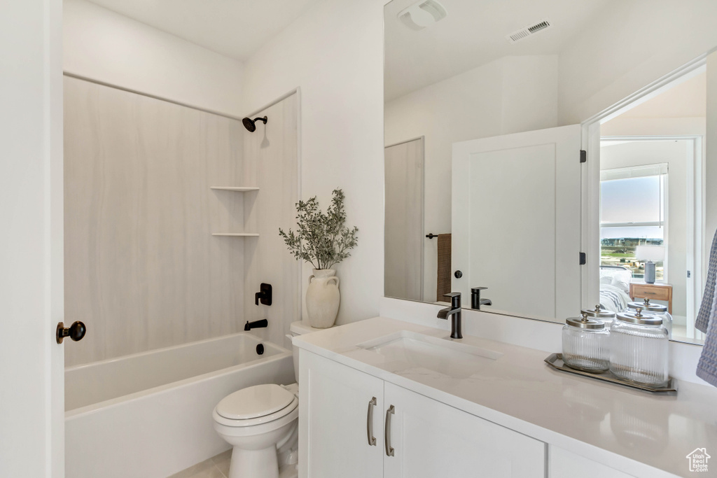 Bathroom with vanity, toilet, tile patterned floors, shower / bathing tub combination, and visible vents