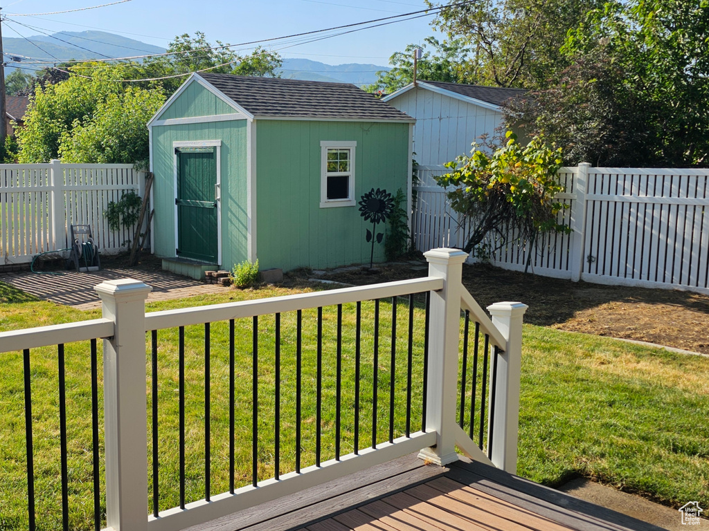 View of shed featuring a fenced backyard